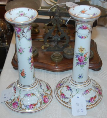 Lot 596 - A pair of German porcelain floral decorated...