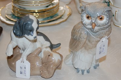 Lot 597 - Two Nao porcelain figure groups, one modelled...