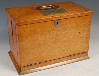 Lot 599 - A late 19th century oak stationery cabinet/...