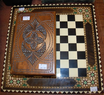 Lot 609 - A chess set comprising horn pieces, contained...