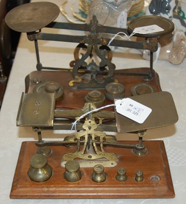 Lot 611 - Two vintage mahogany and brass tabletop...