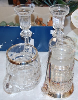 Lot 621 - A pair of glass candlesticks; white metal...