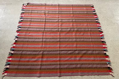 Lot 629 - A vintage paisley shawl, worked in white,...