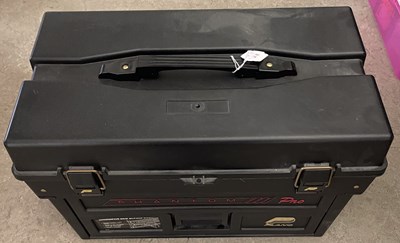 Lot 687 - A black coloured fishing tackle box containing...