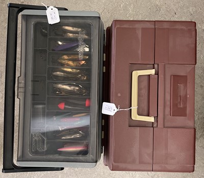 Lot 688 - Two fishing tackle boxes containing assorted...