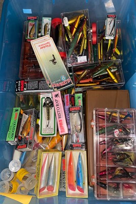 Lot 690 - A box of assorted fishing tackle, mainly lures,...