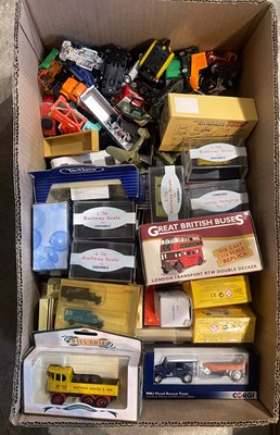 Lot 739 - A box of assorted model cars and vans, some...