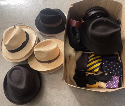 Lot 744 - A box of assorted gentlemans hats; belts; ties;...