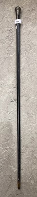Lot 750 - A white metal mounted ebonised walking cane.