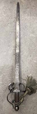 Lot 753 - A reproduction broadsword, the blade with...