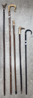Lot 755 - Five assorted Shepherds crooks; walking canes;...