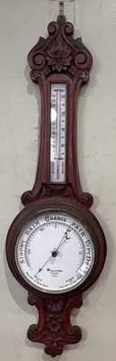 Lot 840 - Dollond, London, an oak framed wheel barometer,...