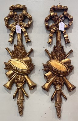 Lot 841 - A pair of giltwood wall mounted carvings...