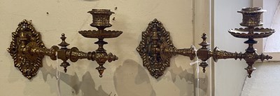 Lot 843 - A pair of gilt metal candle sconces.