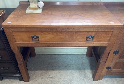 Lot 848 - Derek 'Lizardman' Slater, an Arts & Crafts oak...