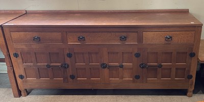 Lot 849 - Derek 'Lizardman' Slater, an Arts & Crafts oak...