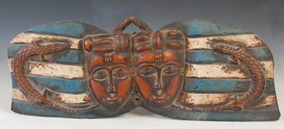 Lot 867 - A carved and painted wood tribal mask,...