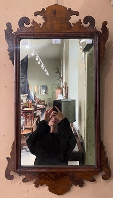 Lot 877 - An antique walnut fret-cut rectangular mirror,...