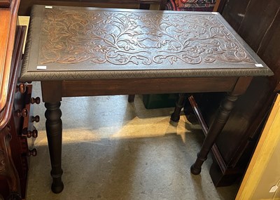 Lot 884 - A late 19th century carved and stained oak...