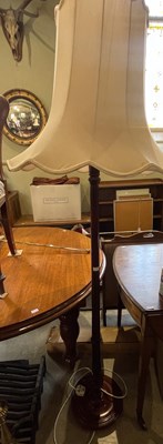 Lot 723 - Two standard lamps and shades.