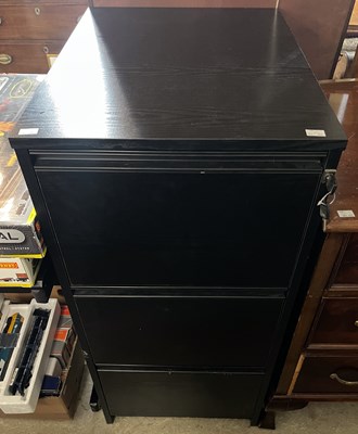 Lot 768 - An ebonised three drawer filing cabinet, 48cm...
