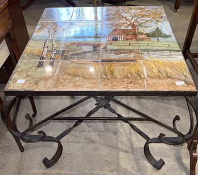 Lot 917 - A wrought iron occasional table with...