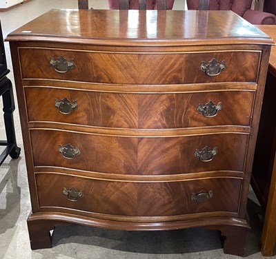 Lot 922 - A reproduction mahogany serpentine chest of...