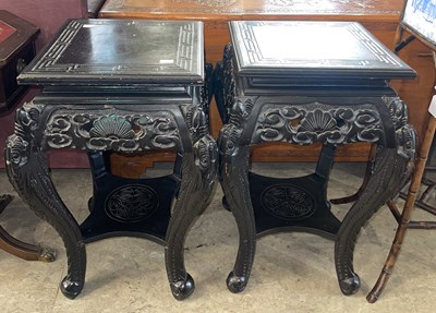 Lot 936 - A pair of Japanese ebonised urn stands, late...