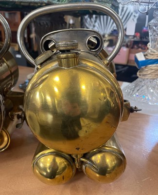 Lot 636 - A pair of white metal and brass Lucas King of...