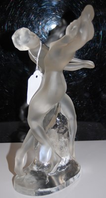 Lot 482 - A Lalique clear and frosted glass figure group...