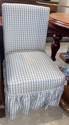 Lot 957 - A nursing chair with blue and white chequered...