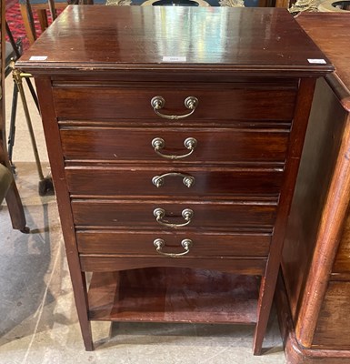 Lot 960 - An early 20th century mahogany music cabinet...