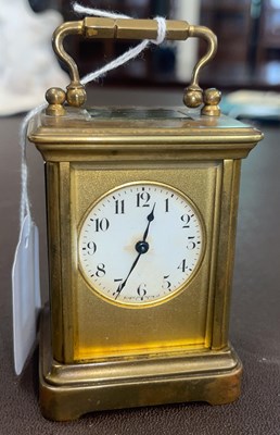 Lot 476A - A small brass carriage clock, the circular...