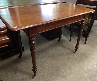 Lot 965 - A Victorian mahogany side table, the rounded...