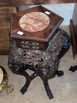 Lot 972 - A Chinese darkwood pentagonal shaped urn stand,...