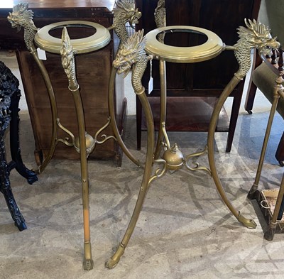 Lot 974 - A pair of brass jardiniere stands, early 20th...