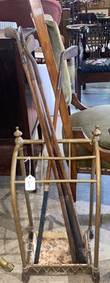 Lot 975 - An early 20th century brass six division stick...