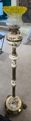 Lot 986 - A ceramic and gilt metal paraffin burning...