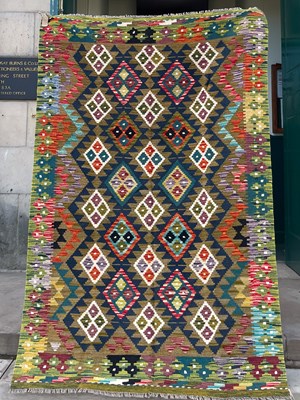 Lot 996 - A Maimana Kilim, the earth coloured ground...