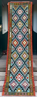 Lot 999 - A Maimana Kilim runner, the blue coloured...