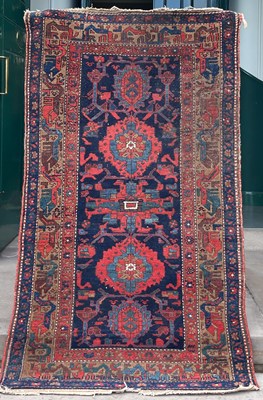 Lot 878 - A Persian rug, late 19th/ early 20th century,...