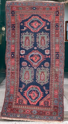 Lot 1011 - A Persian rug, late 19th/ early 20th century,...