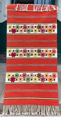 Lot 1013 - A tufted Kilim rug, with three ivory ground...