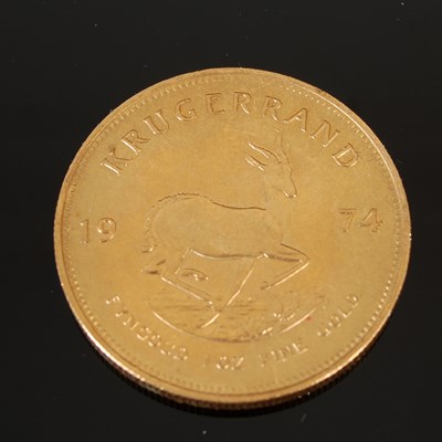 Lot 90C - A South African gold Krugerrand, dated 1974.