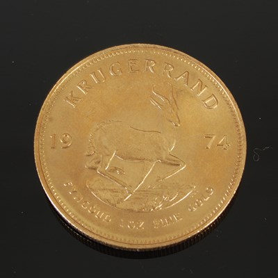 Lot 90E - A South African gold Krugerrand, dated 1974.