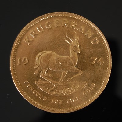 Lot 90J - A South African gold Krugerrand, dated 1974.