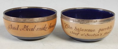 Lot 3 - A pair of Royal Doulton Stoneware silver...
