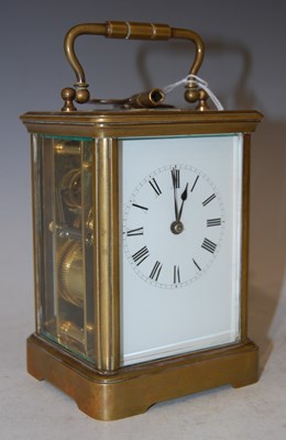 Lot 90 - A late 19th century brass cased carriage clock...