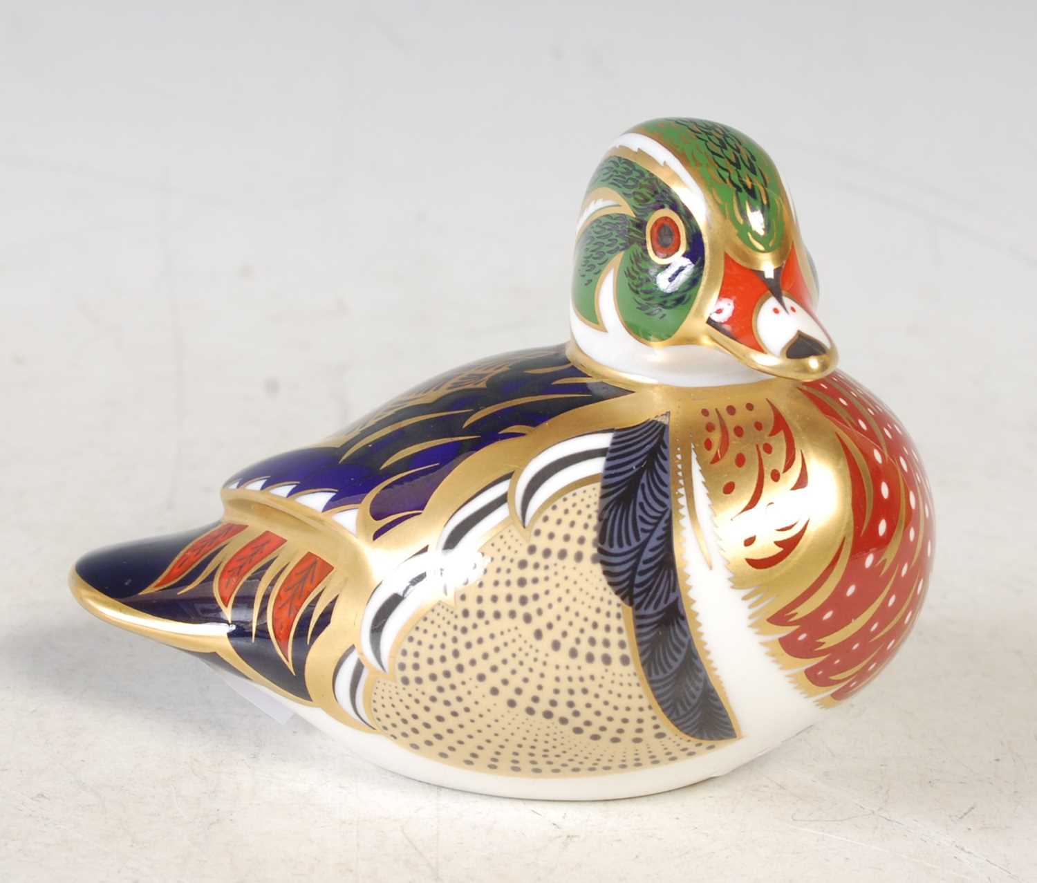 Lot 21 - A Royal Crown Derby Carolina Duck paperweight,...