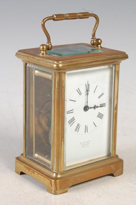 Lot 22 - An early 20th century brass carriage clock,...